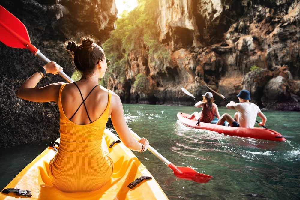 Kayaking through a calm tropical bay