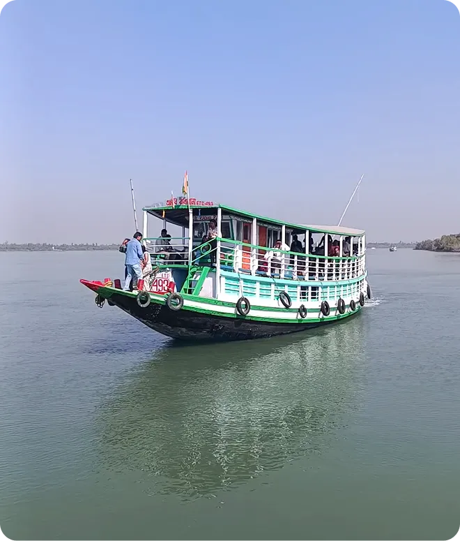 A passenger boat on a calm river, a common sight on India's spiritual river routes